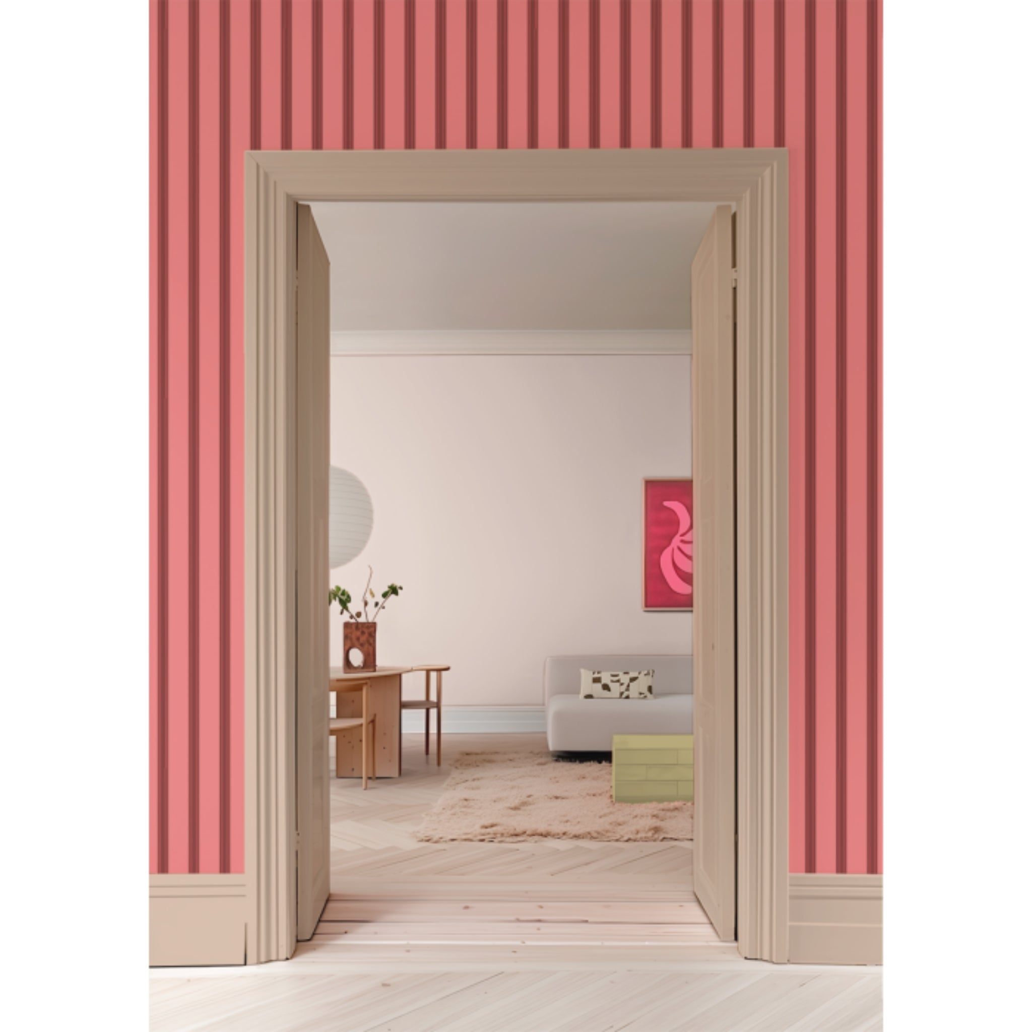 Behang Juna Kers van Bibelotte in een sfeervolle babykamer of kinderkamer met kersenroze streeppatroon