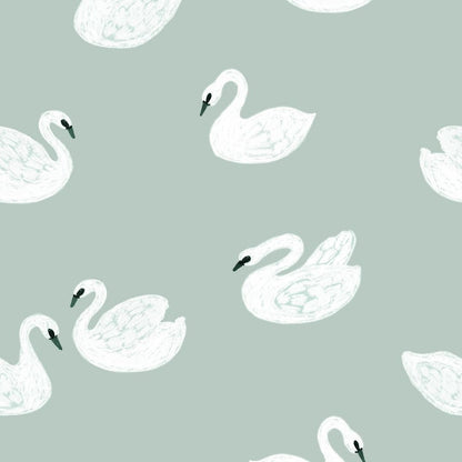 Detail van kinderkamer behang met sierlijke zwanen in heldere blauw groene kleir en dromerige stijl